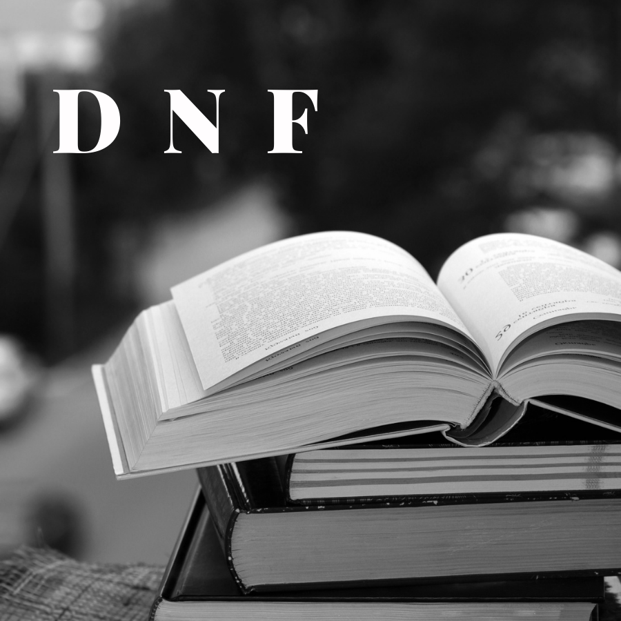 A black and white photo of a stack of books, the one on top is open. The letters DNF are in the top left corner