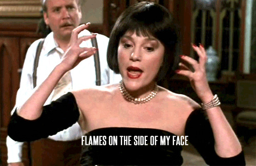 Mrs. White from the movie Clue speaking about flames on the side of her face.
