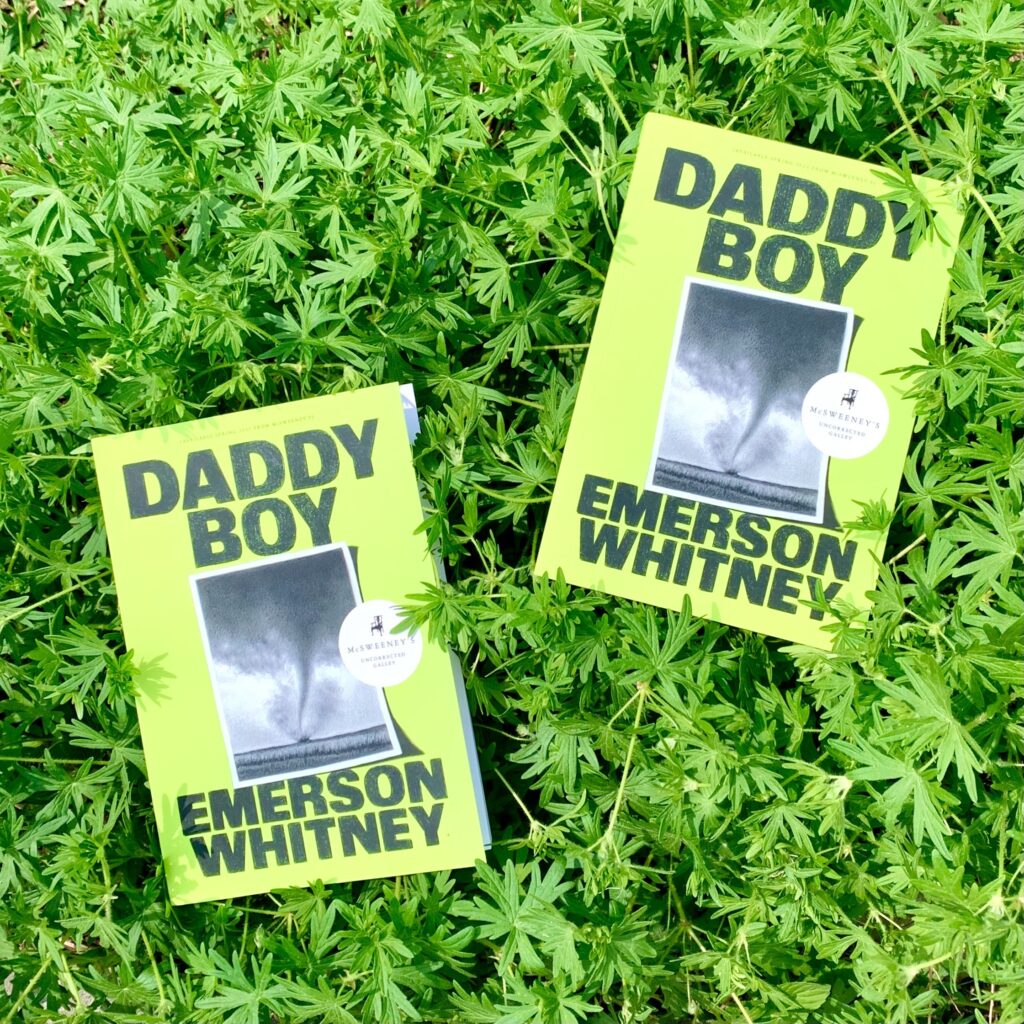 Two copies of Daddy Boy by Emerson Whitney chilling in a bush