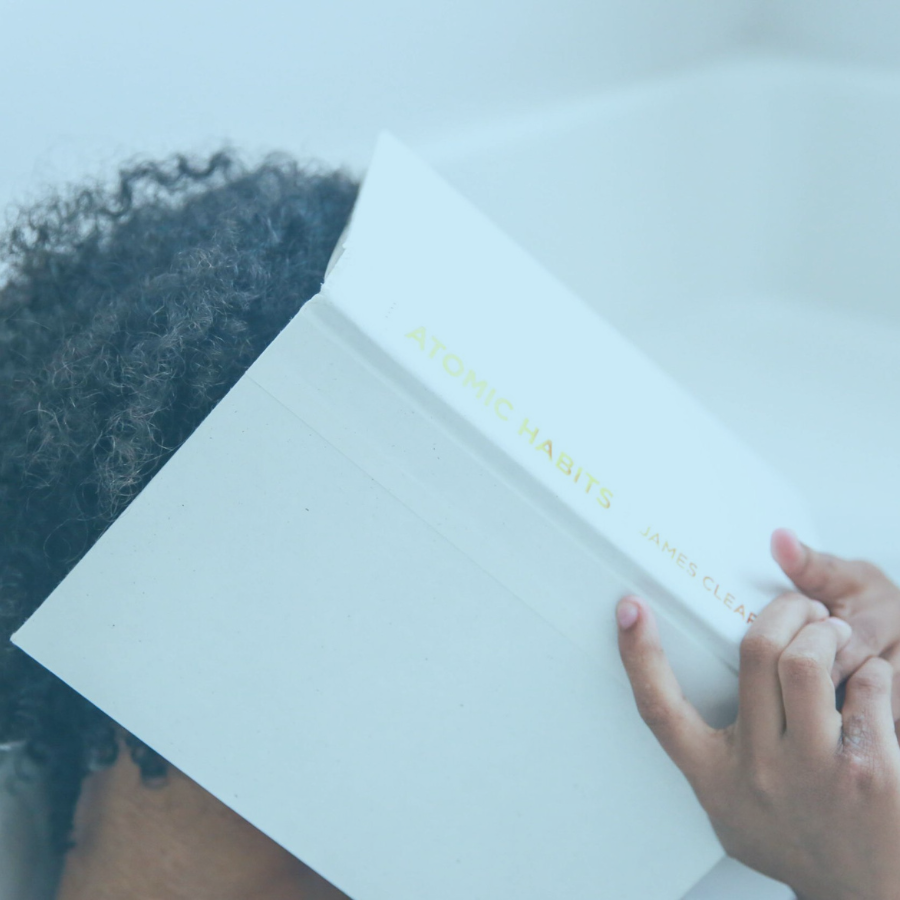 featured image for Mental Healrth Awareness Is Not Enough - woman covering face with book